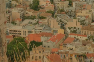 a view of a city from the top of a hill