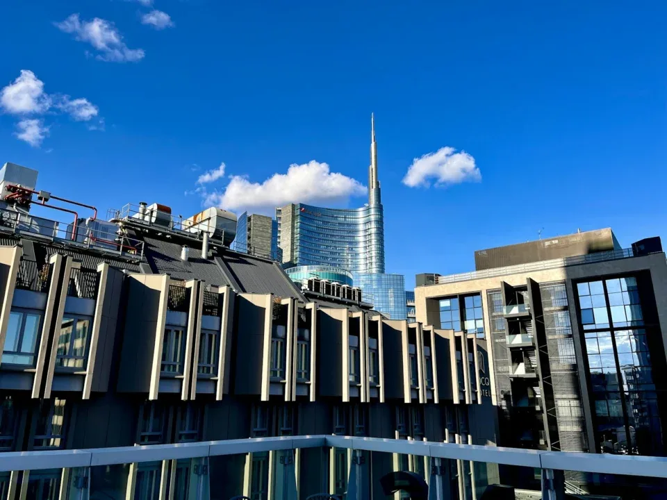 a tall building with a sky scraper on top of it